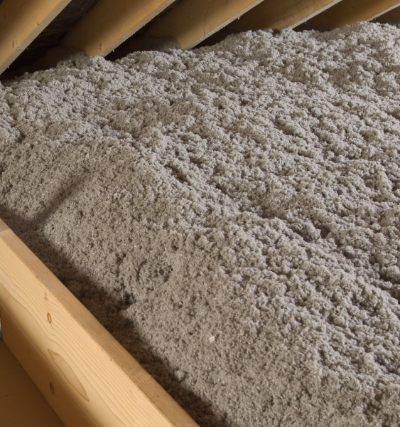 Close up of cellulose insulation in an attic